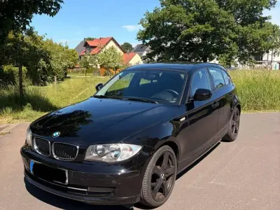 Käytetty BMW 116 122 HP (89 kW) 2010 Musta Viistoperä