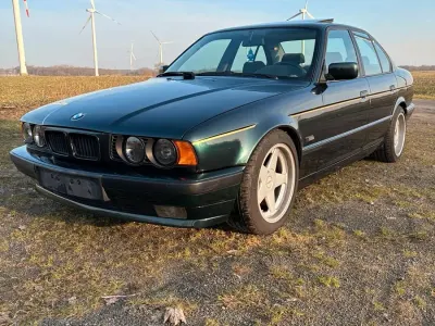 Gebraucht BMW 520 150 PS (110 kW) 1995 Grün Limousine