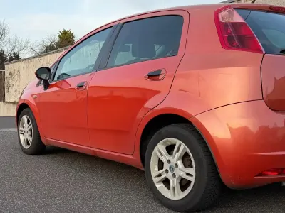 Gebraucht Fiat Grande Punto 77 PS (56 kW) 2006 Orange Kleinwagen