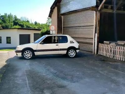 Gebraucht Peugeot 205 GTi 120 PS (88 kW) 1989 Weiß Kleinwagen