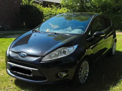 Gebraucht Ford Fiesta Titanium 70 PS (51 kW) 2011 Schwarz Kleinwagen
