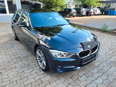 Gebraucht BMW 320 Comfort Edition 184 PS (135 kW) 2014 Black sapphire metallic Kombi