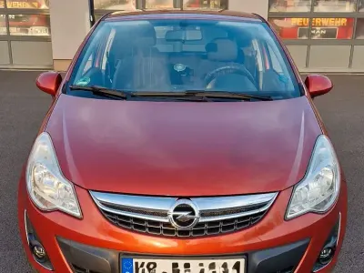 Używany Opel Corsa Edition 69 KM (50 kW) 2012 Pomarańczowy Hatchback