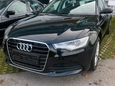 Używany Audi A6 205 KM (150 kW) 2014 Czarny Kombi