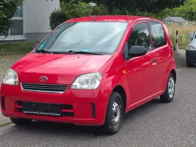 Gebraucht Daihatsu Cuore 58 PS (42 kW) 2005 Rot Kleinwagen