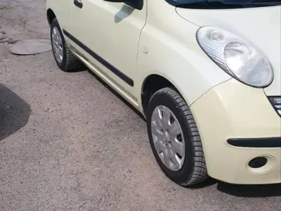 Gebraucht Nissan Micra 65 PS (47 kW) 2006 Gelb Kleinwagen