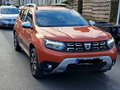 Używany Dacia Duster Prestige 116 KM (85 kW) 2021 Pomarańczowy SUV