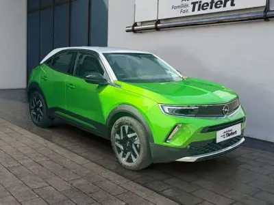 Gebraucht Opel Mokka-e Elegance 100 kW (136 PS) 2022 Grün SUV
