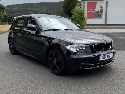 Gebraucht BMW 116 122 PS (89 kW) 2010 Schwarz Kleinwagen