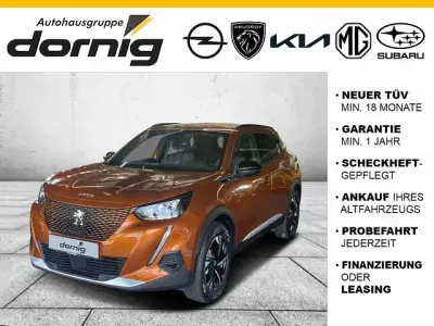 Gebraucht Peugeot e-2008 Allure 100 kW (136 PS) 2023 Orange fusion metallic SUV