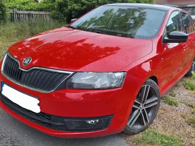 Używany Skoda Rapid Ambition 86 KM (63 kW) 2013 Czerwony Hatchback