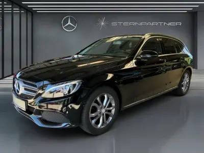 Używany Mercedes C180 156 KM (114 kW) 2016 Czarny Kombi