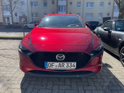 Second-hand Mazda 3 Exclusive-Line 186 CP (136 kW) 2025 Roșu Berlinǎ
