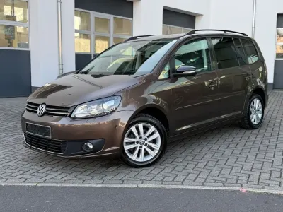 Gebraucht VW Touran Style 105 PS (77 kW) 2011 Braun Van / Kleinbus