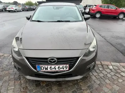 Używany Mazda 3 Center-Line 120 KM (88 kW) 2013 Brązowy Sedan/Limuzyna