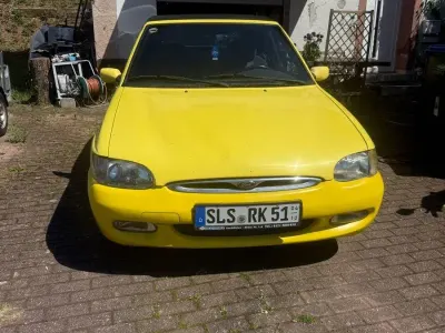 Gebraucht Ford Escort Cabriolet 90 PS (66 kW) 1996 Gelb Cabrio