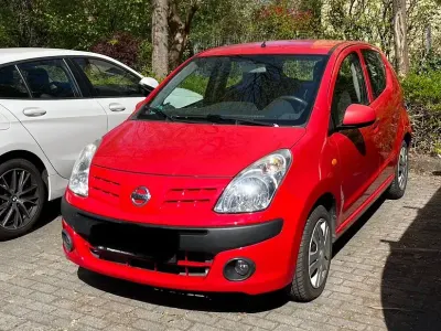 Gebraucht Nissan Pixo 68 PS (50 kW) 2009 Rot Kleinwagen