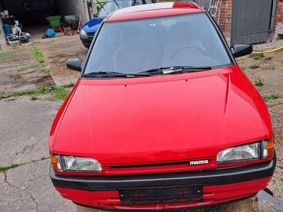 Gebraucht Mazda 323 84 PS (61 kW) 1991 Rot Limousine