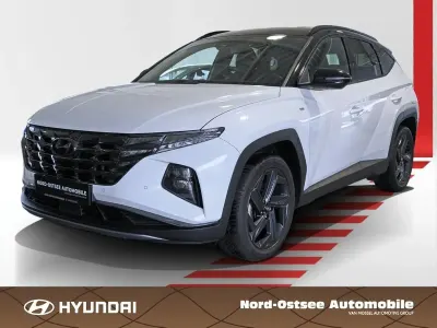 Gebraucht Hyundai Tucson Blackline 180 PS (132 kW) 2023 Serenity white / abyss black / SUV