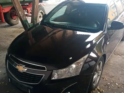 Second-hand Chevrolet Cruze 154 CP (113 kW) 2014 Roșu Break