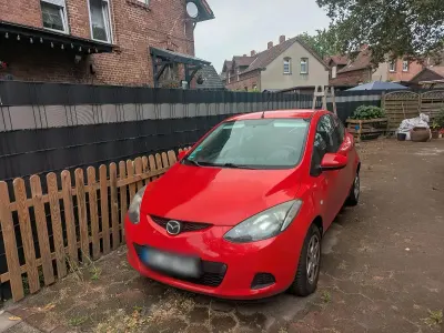 Gebraucht Mazda 2 75 PS (55 kW) 2009 Rot Kleinwagen