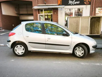 Gebraucht Peugeot 206 Premium 75 PS (55 kW) 2003 Silber Kleinwagen