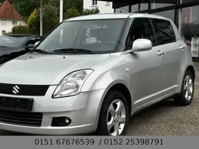 Używany Suzuki Swift Snow 92 KM (67 kW) 2006 Srebrny Hatchback