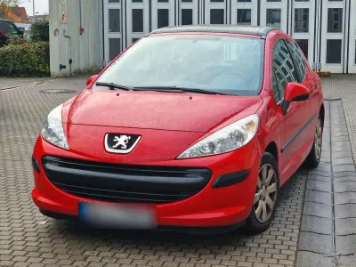 Gebraucht Peugeot 207 90 PS (66 kW) 2009 Rot Kleinwagen