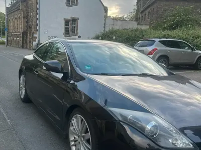 Używany Renault Laguna III 140 KM (102 kW) 2009 Czarny Hatchback