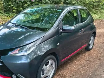 Używany Toyota Aygo 69 KM (50 kW) 2014 Szary Hatchback