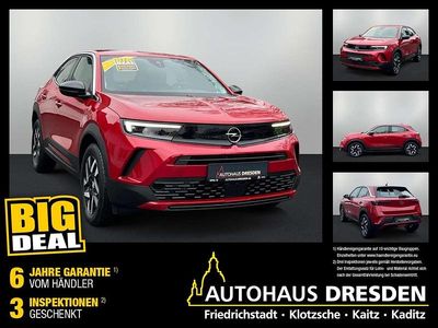Gebraucht Opel Mokka Elegance 101 PS (74 kW) 2024 Kosmos rot (metallic) SUV