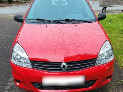 Używany Renault Clio II 59 KM (43 kW) 2011 Czerwony Hatchback
