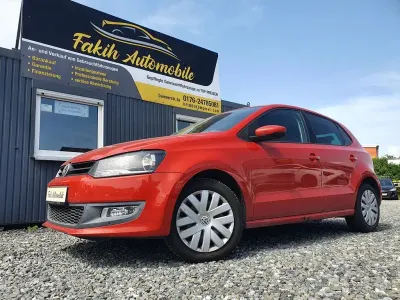 Gebraucht VW Polo Team 69 PS (50 kW) 2010 Hot orange metallic Kleinwagen