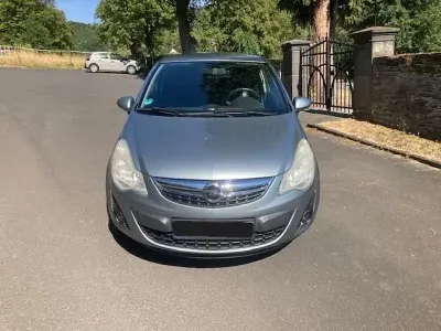 Gebraucht Opel Corsa Satellite 69 PS (50 kW) 2011 Silber Kleinwagen