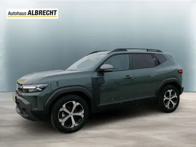 Neu Dacia Duster Journey 158 PS (116 kW) 2025 Staubgrau SUV
