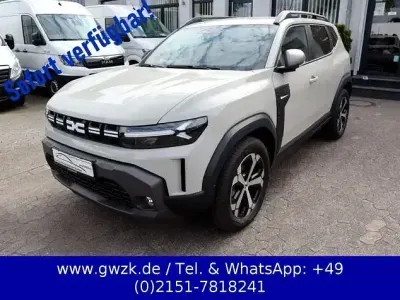 Gebraucht Dacia Duster Journey 141 PS (103 kW) 2024 Sandsteinbeige SUV