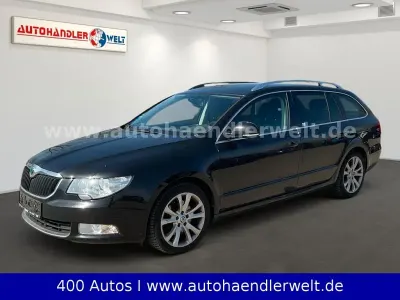 Second-hand Skoda Superb Family 140 CP (102 kW) 2012 Negru Break