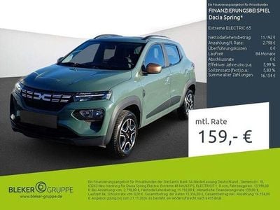 Gebraucht Dacia Spring Extreme 47 kW (65 PS) 2023 Grün "flechtengrau" Kleinwagen