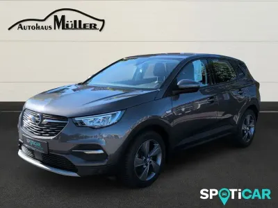 Gebraucht Opel Grandland X Elegance 224 PS (164 kW) 2022 Mondstein grau/e:vulkan grau SUV