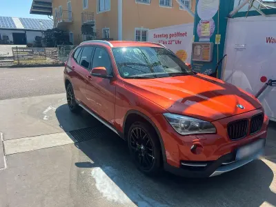 Gebraucht BMW X1 Sport Line 184 PS (135 kW) 2013 Orange SUV