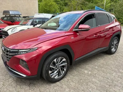 Gebraucht Hyundai Tucson 136 PS (100 kW) 2021 Sunset red SUV