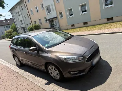 Gebraucht Ford Focus Titanium 101 PS (74 kW) 2015 Braun Kombi