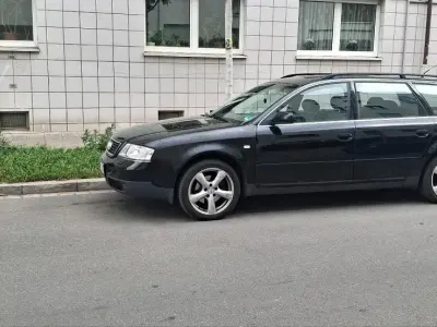 Używany Audi A6 193 KM (141 kW) 1999 Czarny Kombi