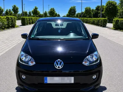 Usado VW up! 75 CV (55 kW) 2013 Negro Utilitario