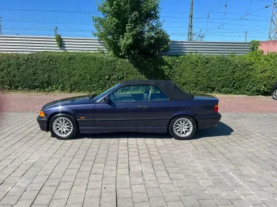 Gebraucht BMW 318 116 PS (85 kW) 1997 Violet Cabrio