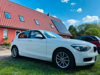 Używany BMW 116 Urban Line 136 KM (100 kW) 2014 Biały Hatchback