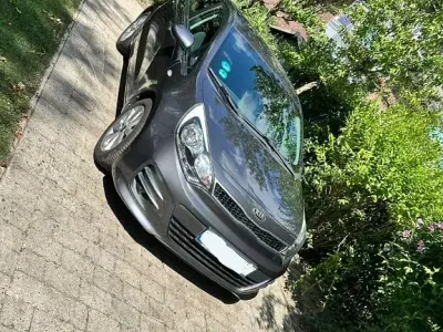 Gebraucht Kia Rio Attract 84 PS (61 kW) 2015 Grau Limousine