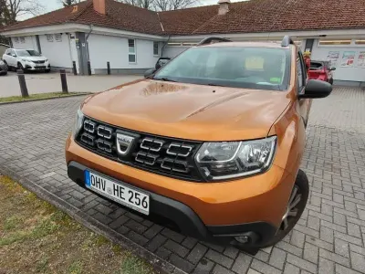 Używany Dacia Duster 101 KM (74 kW) 2020 Pomarańczowy SUV