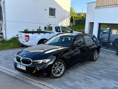 Gebraucht BMW 320e Sport Line 204 PS (150 kW) 2022 Schwarz Kombi