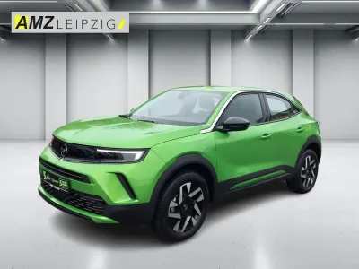 Gebraucht Opel Mokka Elegance 101 PS (74 kW) 2024 Matcha green SUV